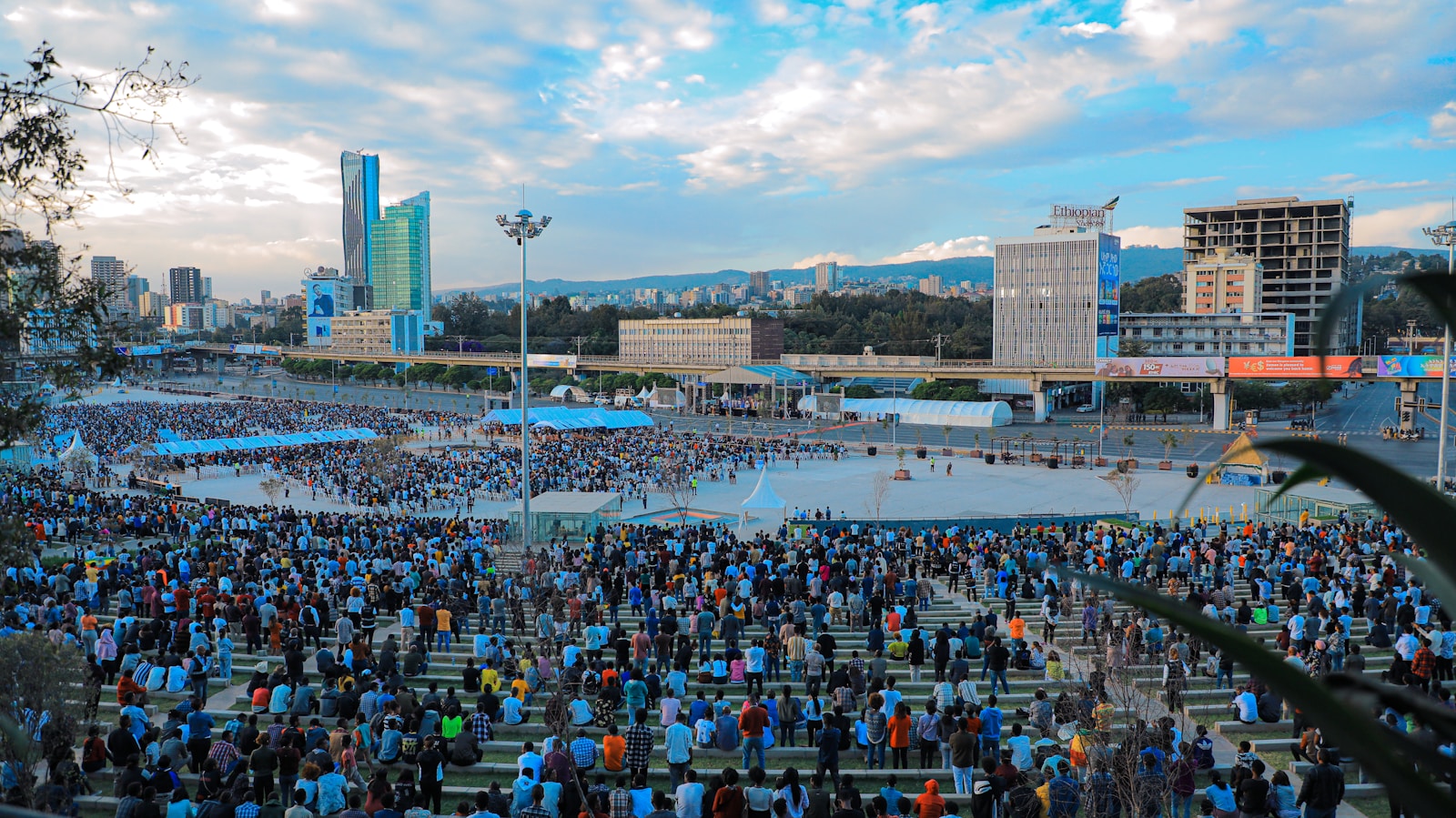 a group of people in a large city